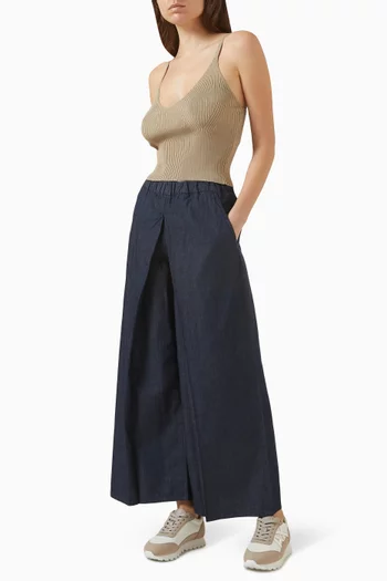 بلوزة بفتحة رقبة على شكل حرف V‏ من نسيج مضلع