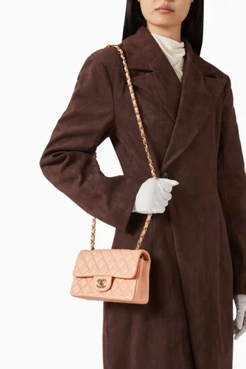 حقيبة كلاسيكية ميني بغطاء قلاب جلد ماعز