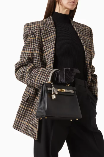 حقيبة كيلي 25 بيد علوية جلد سويفت