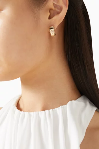 أقراط توبوغاس ذهب أصفر عيار 18