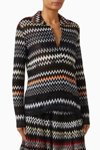 بلوزة منسوجة بنقشة خطوط متعرجة