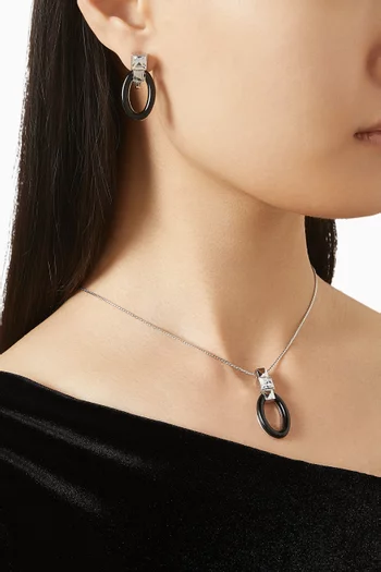 طقم قلادة وأقراط بتصميم بيضاوي فينتج من الثمانينات فضة مطلية بالروديوم