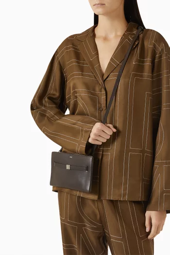 حقيبة كروس بحزام جلد