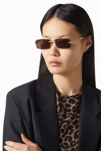 نظارة شمسية بإطار مستطيل معدن مطلي بلون ذهبي