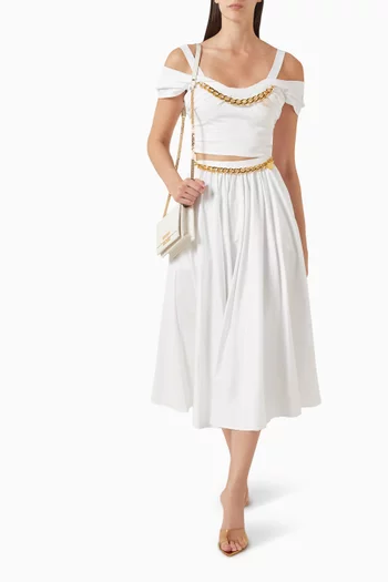 بلوزة قصيرة مزينة بتطريزات قطن مطاطي