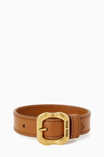 سوار بشعار الماركة نحاس بلون ذهبي وجلد