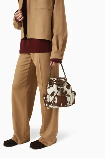 حقيبة ظهر بشعار الماركة جلد بنقشة جلد البقر