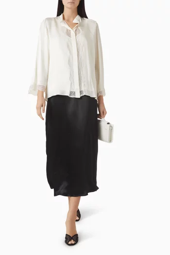 قميص بأشرطة دانتيل