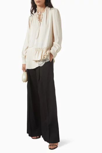 بلوزة بكشكش ودانتيل