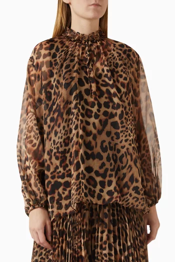 بلوزة بنقشة جلد الفهد