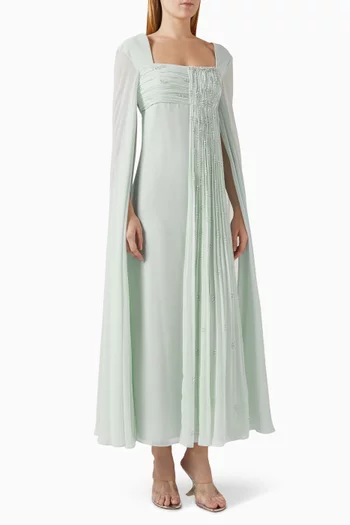 فستان سهرة مزين بكشكش وتطريزات