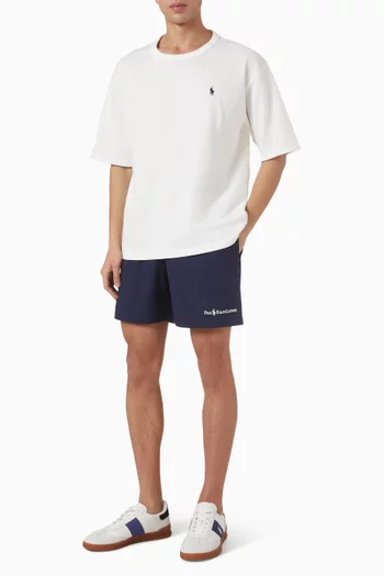 Traveler Mid Swim Shorts