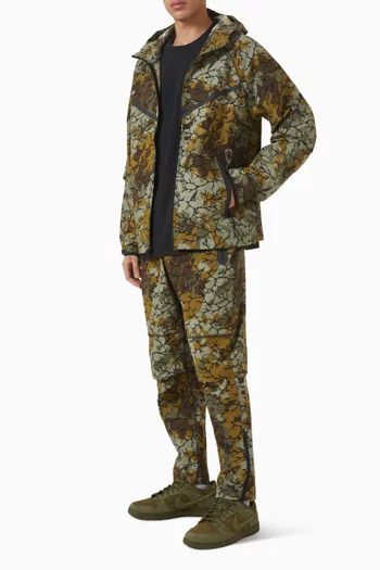 جاكيت ويندرانر بسحّاب كامل منسوج من قماش معالج