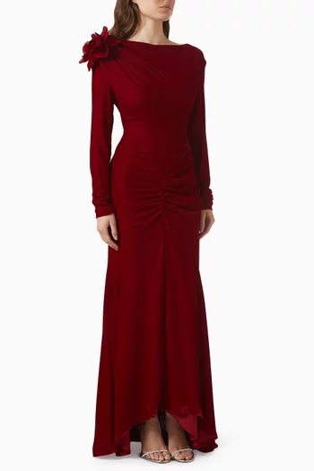 فستان بكشكش وزهرة بارزة