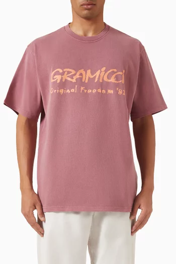 تي شيرت مصبوغ بطبعة شعار Freedom قطن جيرسيه