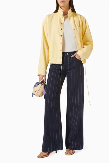 بنطال جينز كاري بخصر منخفض وقصة ساق واسعة دينم