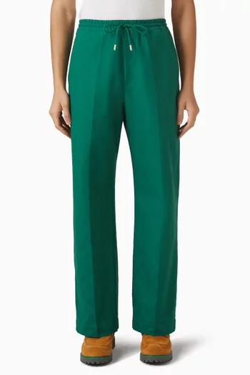 بنطال بشعار الماركة بيكيه