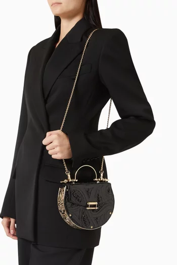 حقيبة أوك بتصميم محفور ويد علوية جلد لامع