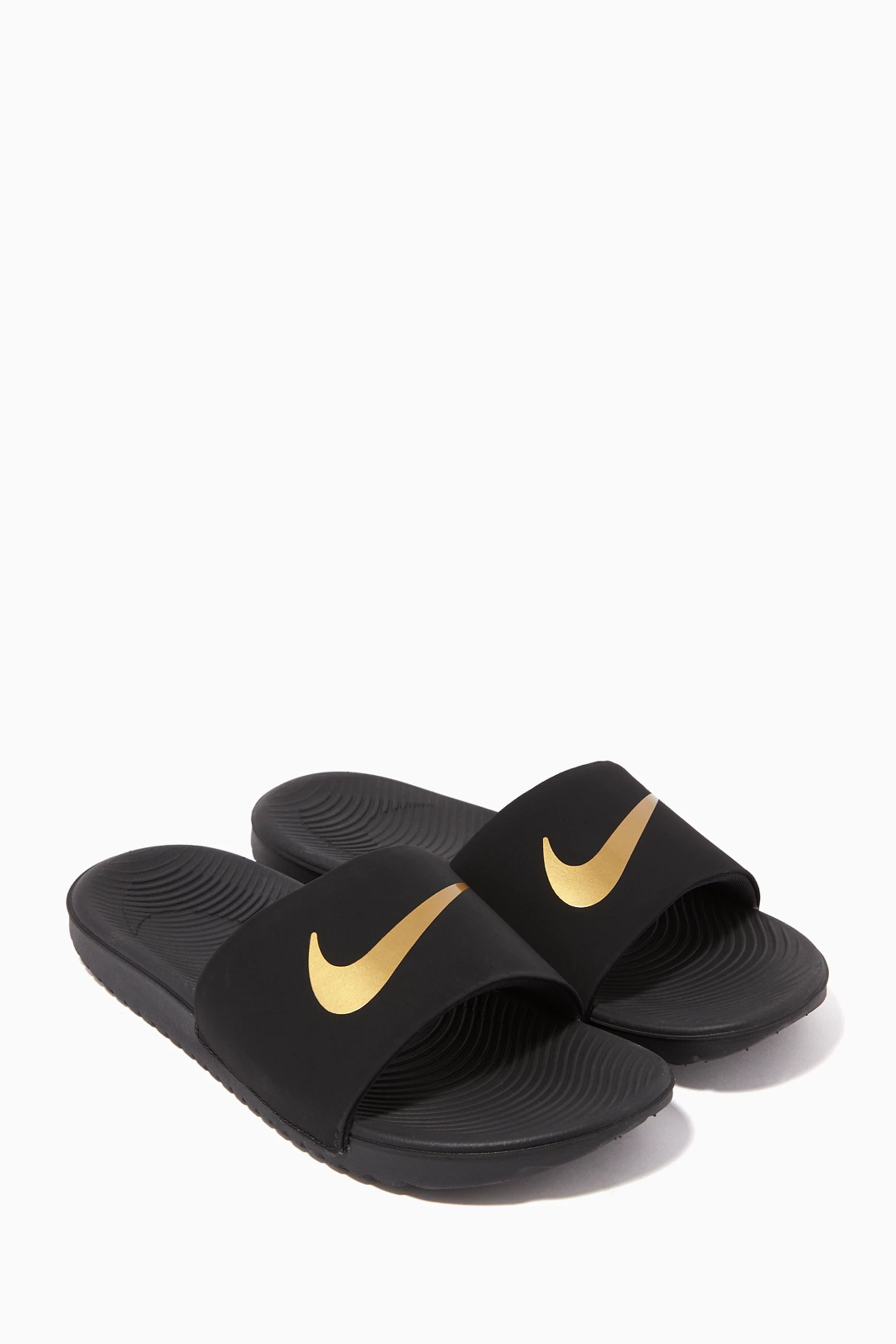 Nike kawa black and gold sliders sales