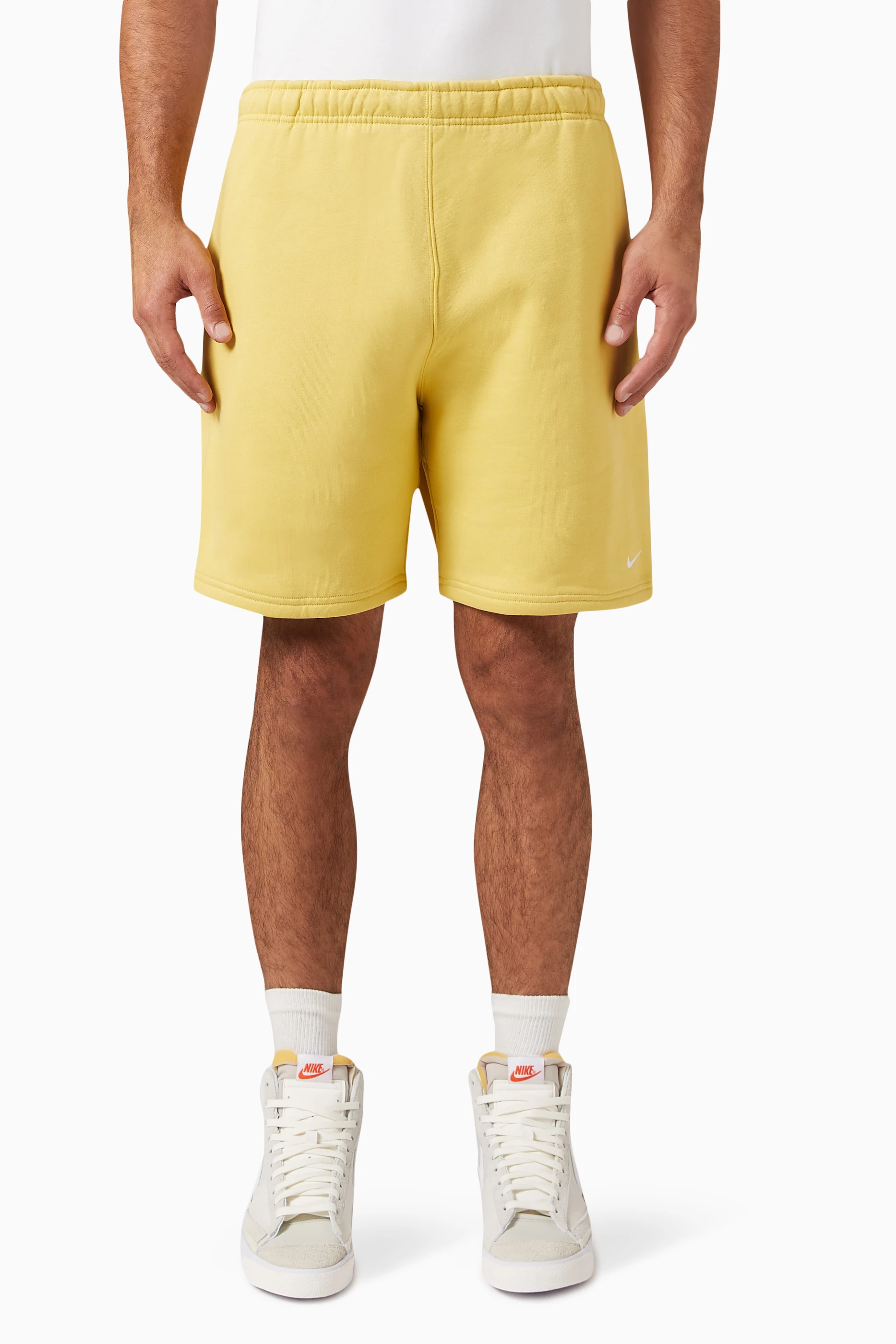 Nike shorts men yellow sales