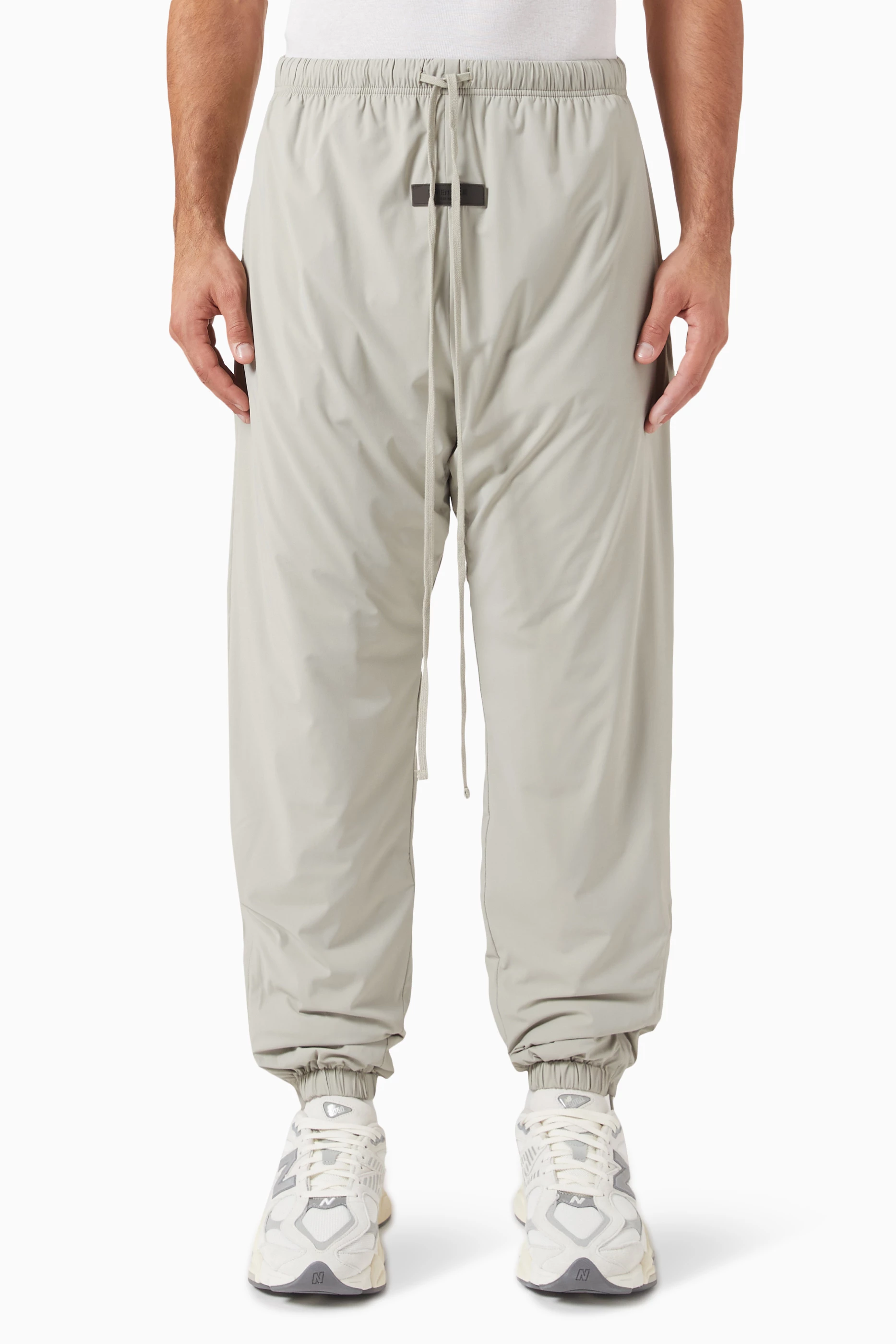 Buy Fear of God Essentials Grey Logo Track Pants in Nylon for Men