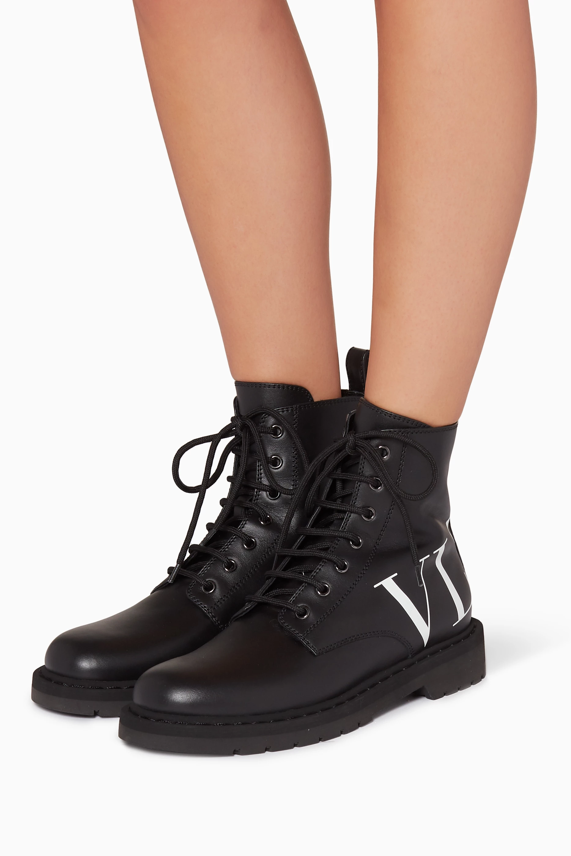 Buy Valentino Garavani Black Black VLTN Combat Boots for Women Online Ounass Kuwait