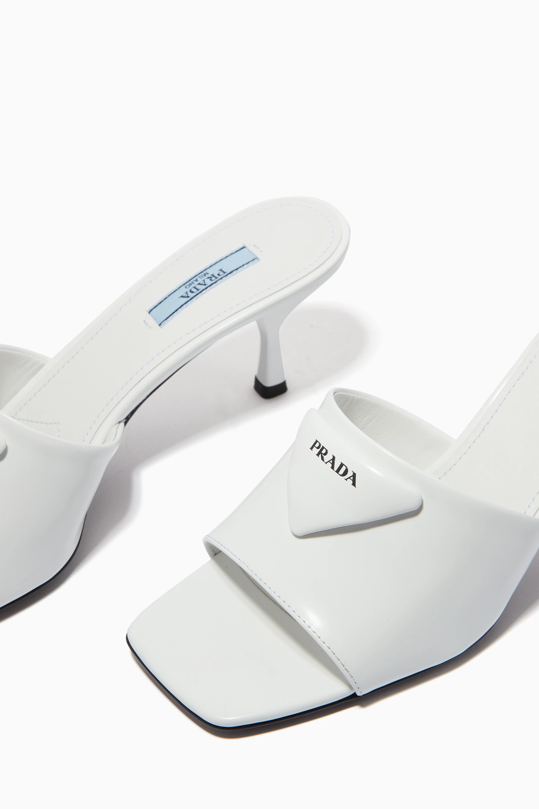 Buy Prada White Logo Triangle 65 Mules in Brushed Leather for Women Online Ounass Kuwait