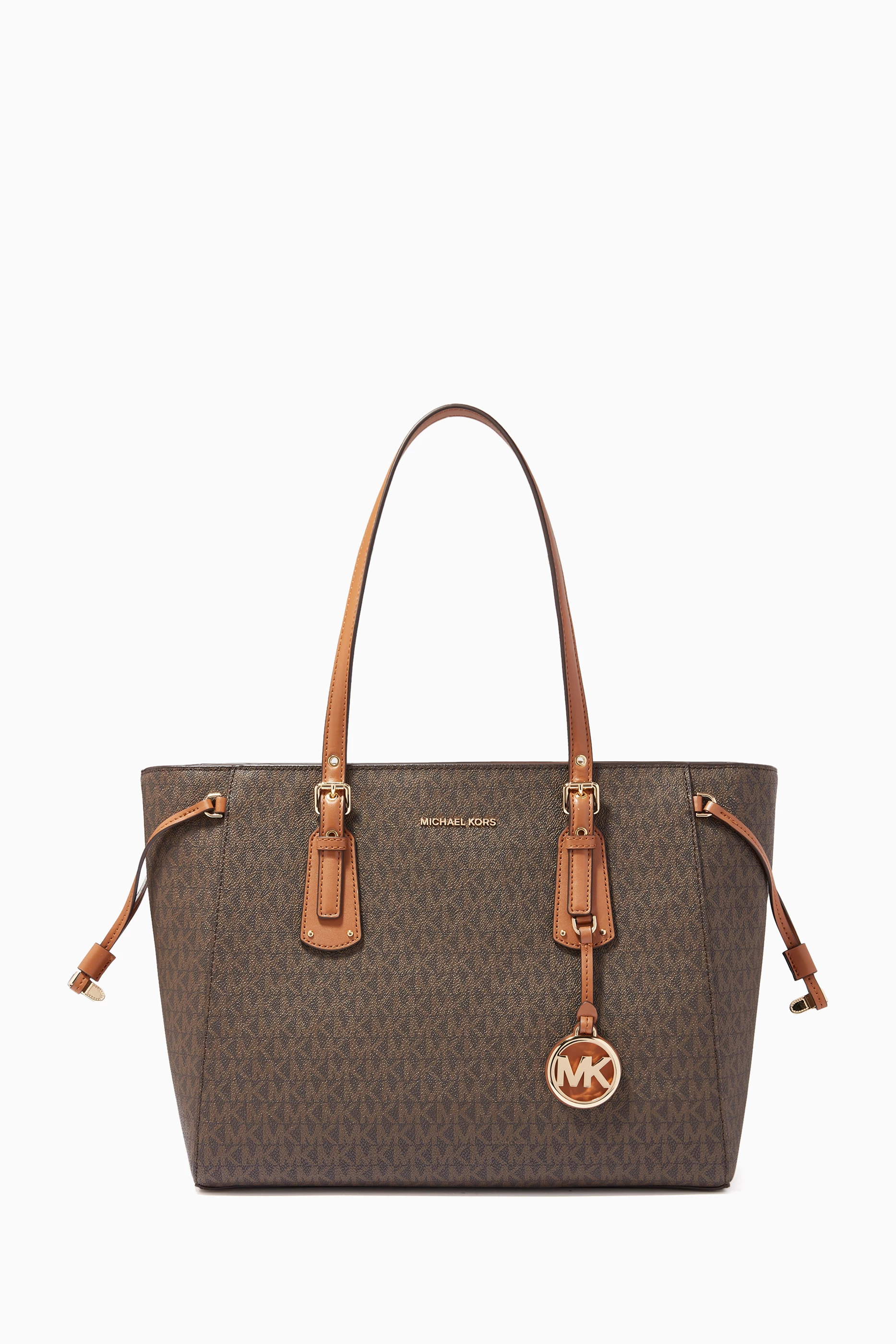 Buy Michael Kors Brown Medium Voyager Tote Bag in Logo Canvas for
