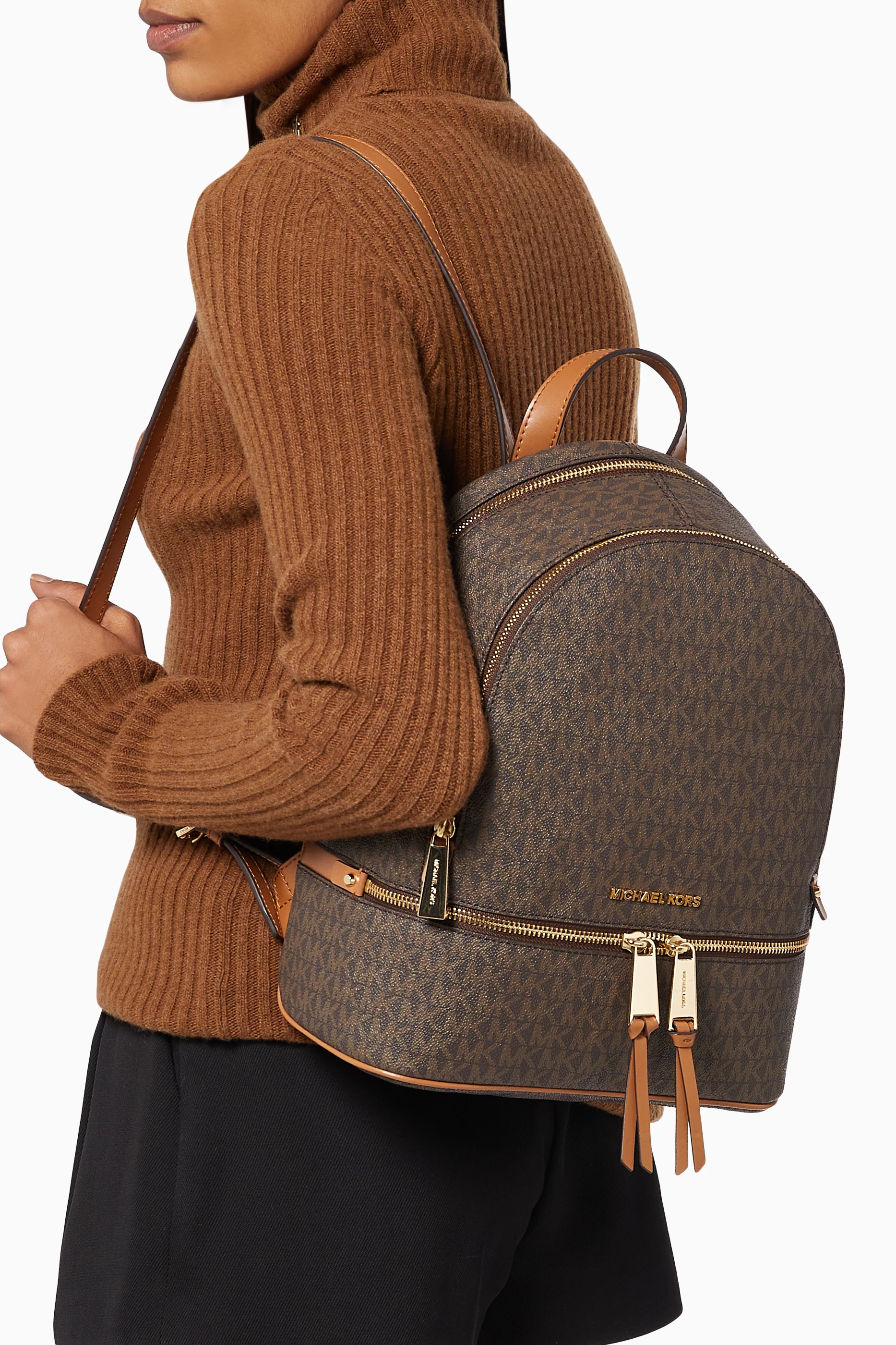 Buy Michael Kors Brown Medium Rhea Backpack in Logo Canvas for