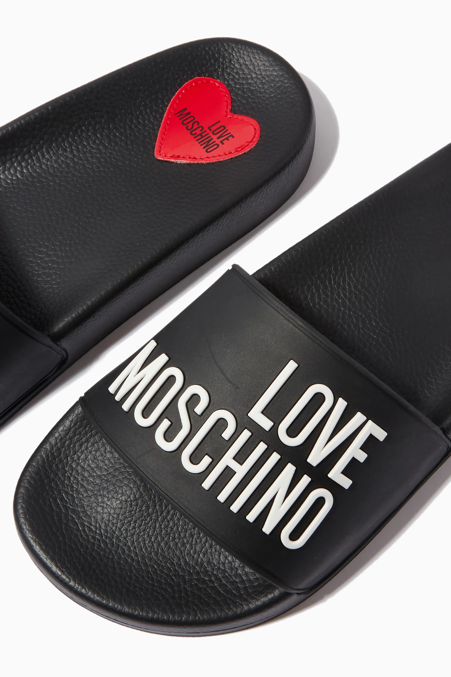 Moschino pool slides on sale