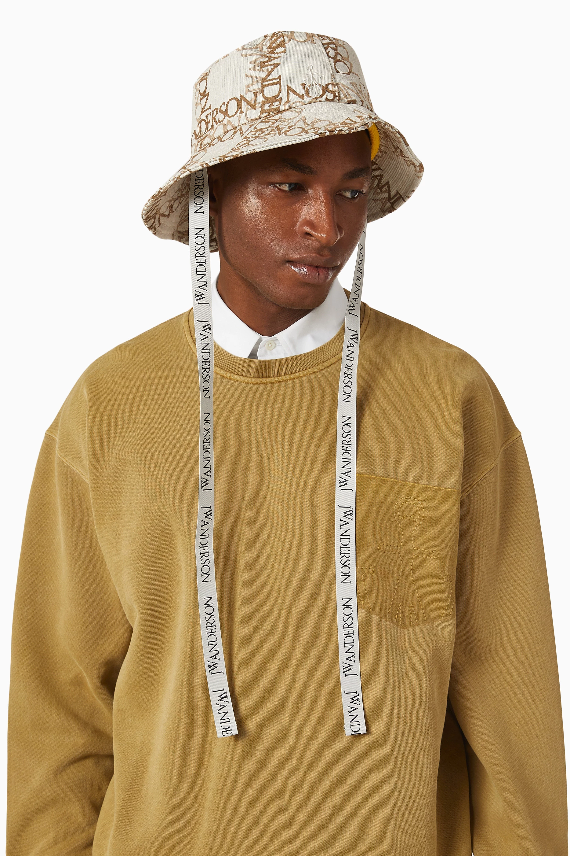 Buy JW Anderson Neutral Asymmetric Logo Monogram Bucket Hat in