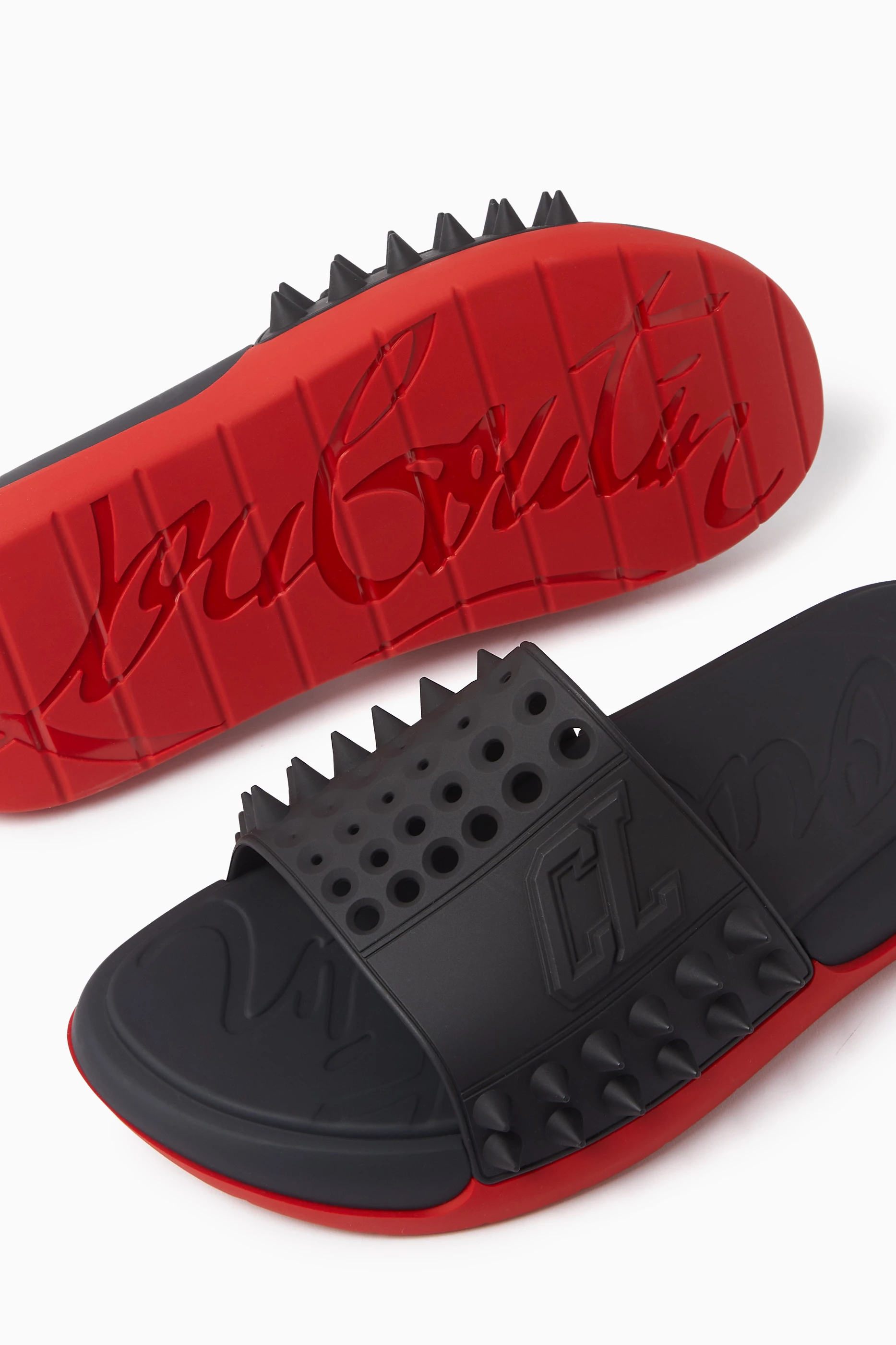 Buy Christian Louboutin Black Take It Easy Slides in Rubber for Men Online Ounass Kuwait