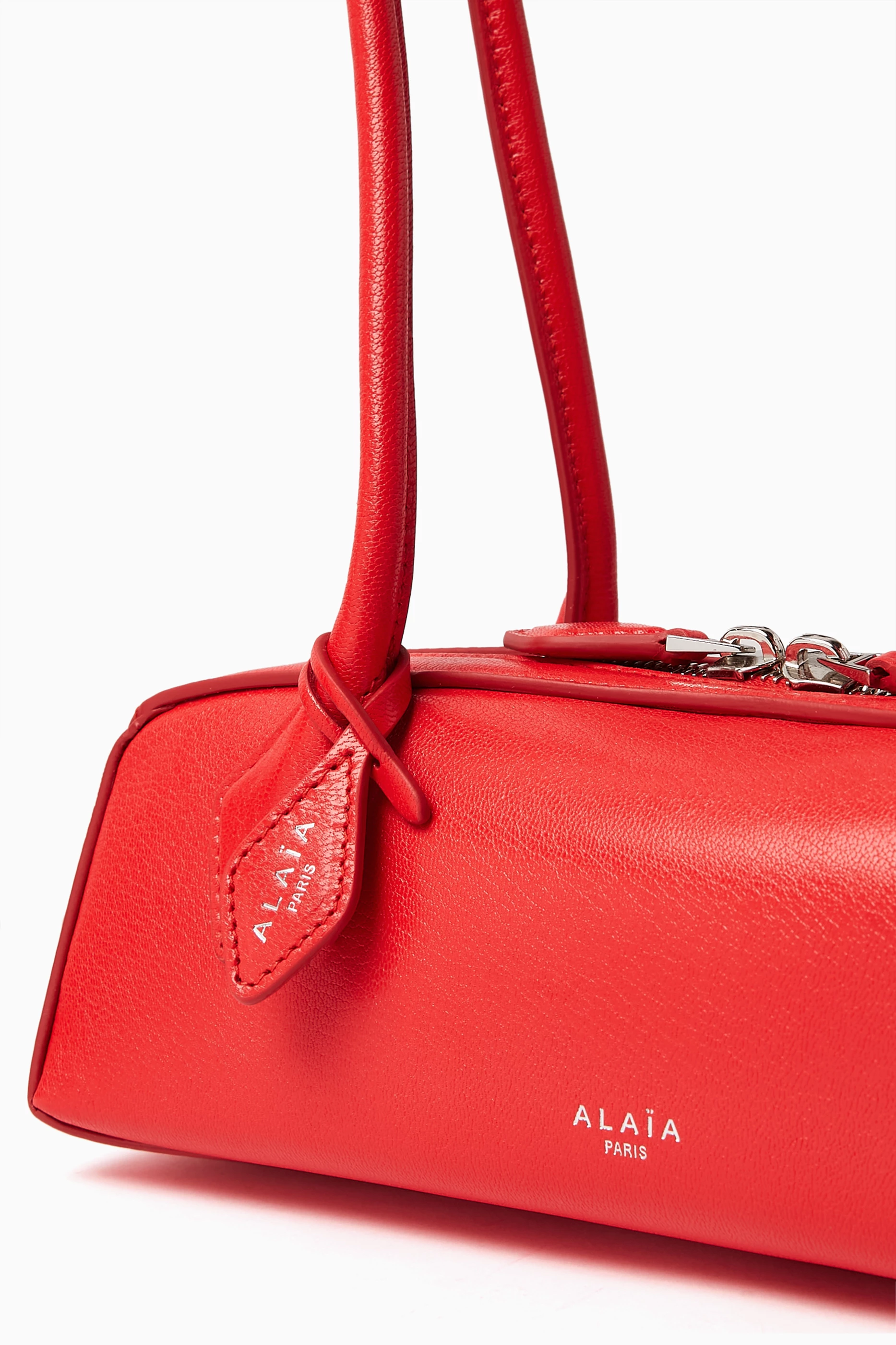 Buy Alaïa Red Small Le Teckel Shoulder Bag in Leather for