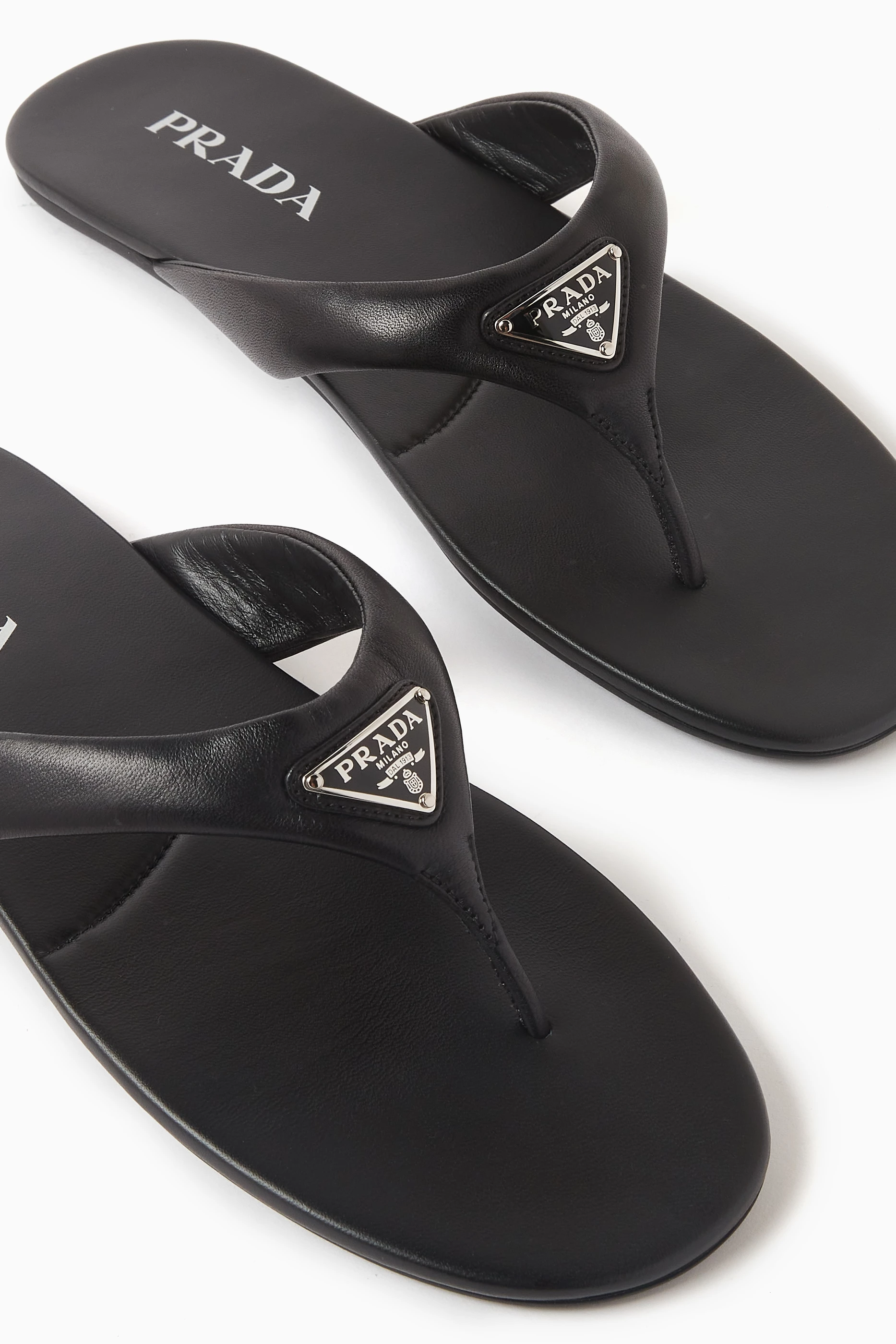 Prada logo flip flop clearance