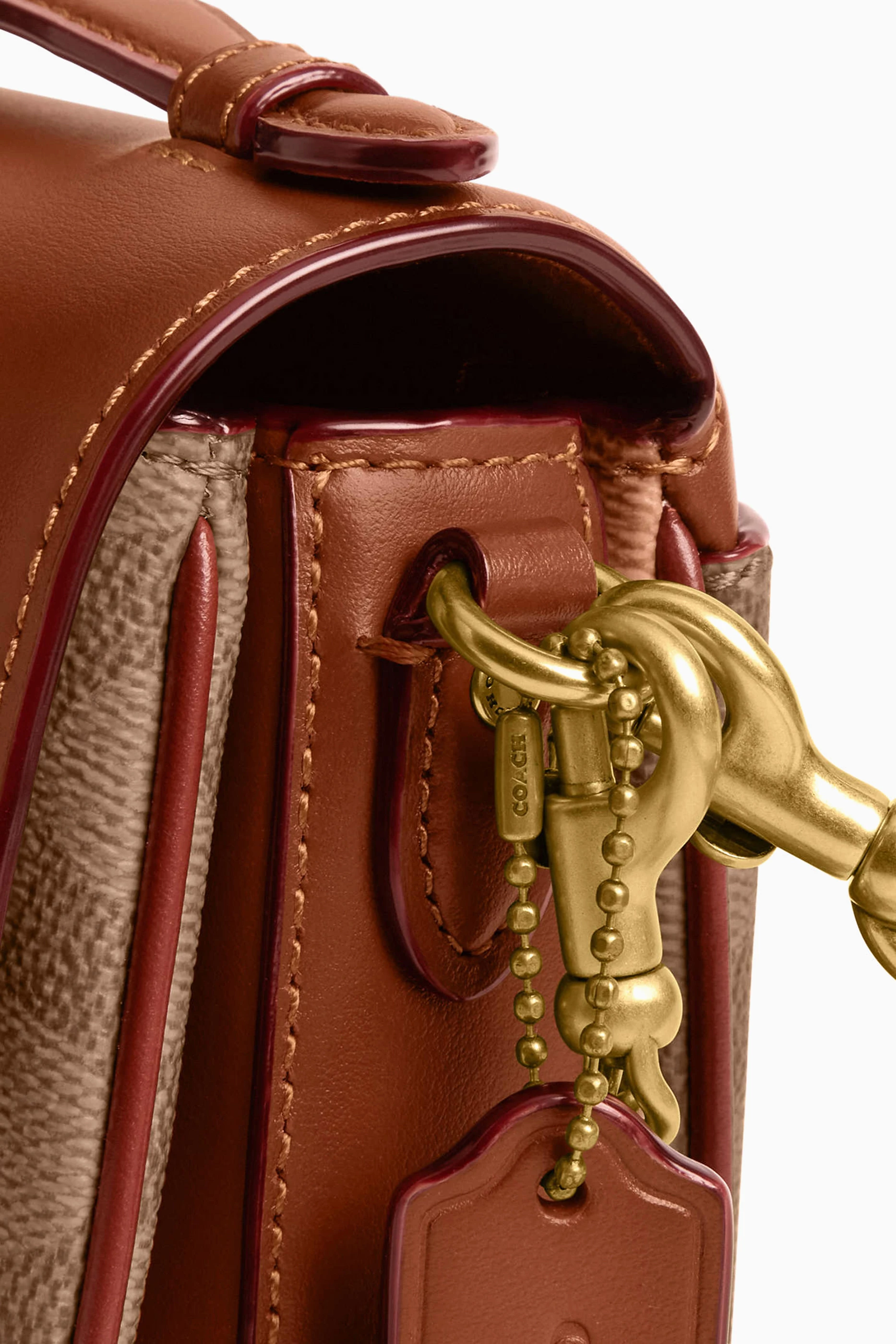 Buy Coach Brown Cassie 17 Crossbody Bag in Signature Canvas
