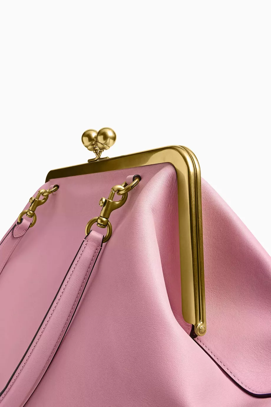 バッグ Coach Kisslock Pink Accessory Pouch The Sold-Out Coach Kisslock Bag Is Secretly Available Here